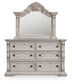 Bruchandi King Upholstered Panel Bed with Mirrored Dresser